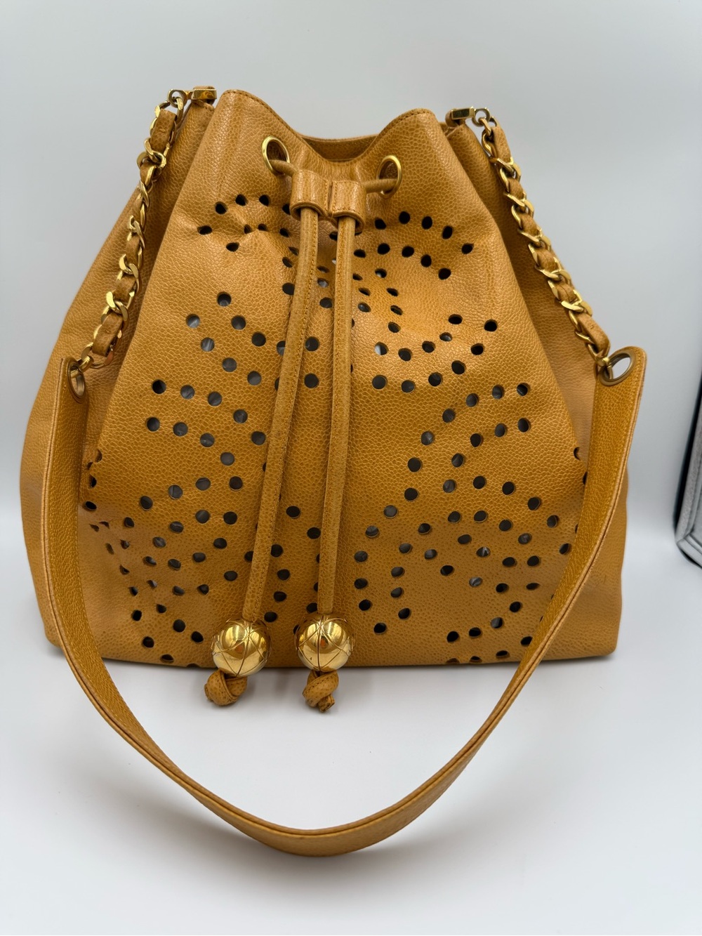 Chanel Perforated Drawstring Bucket Bag in Caviar Leather